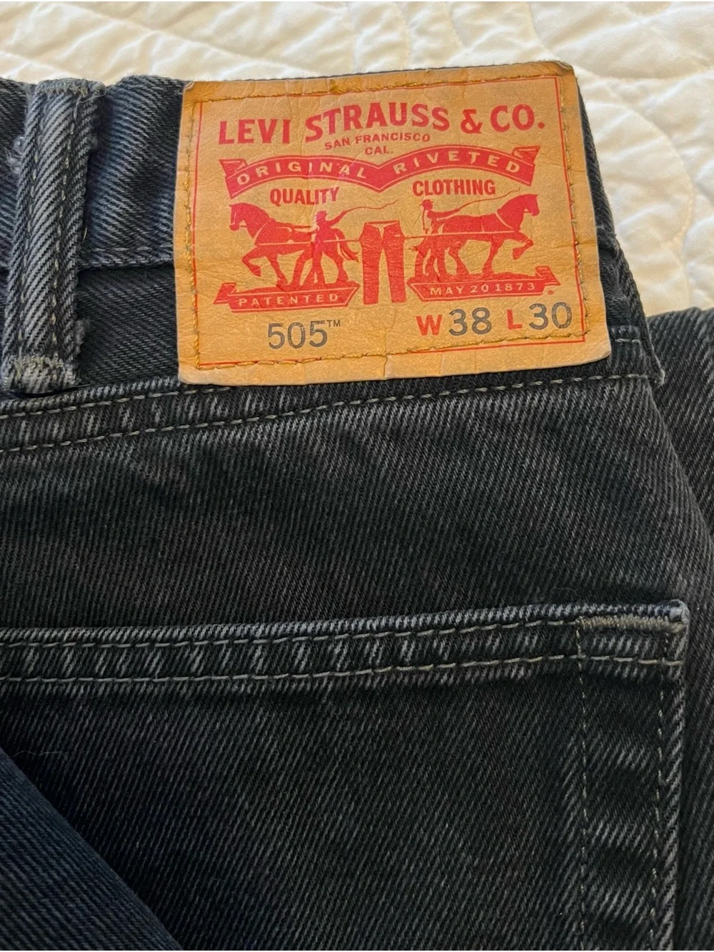 Levi's 505 Relaxed Fit Men's Jeans in Black Denim with Tan Patch